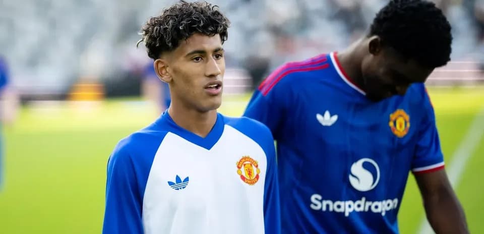 Jugadores de Manchester United en el calentamiento previo