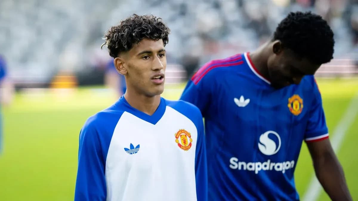 Jugadores de Manchester United en el calentamiento previo
