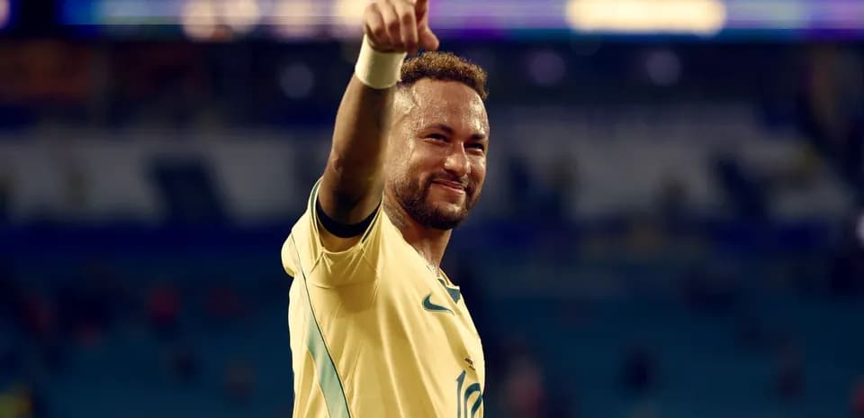 Jugador de fútbol celebrando con el dedo apuntando
