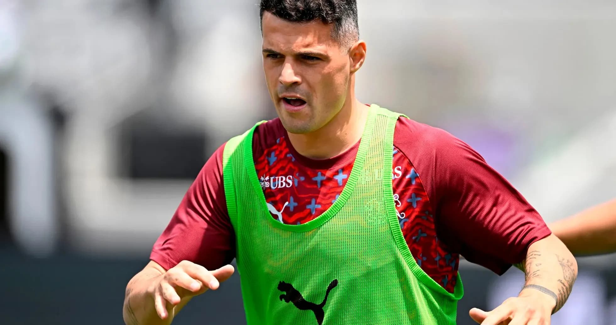 Jugador suizo entrenando antes del partido