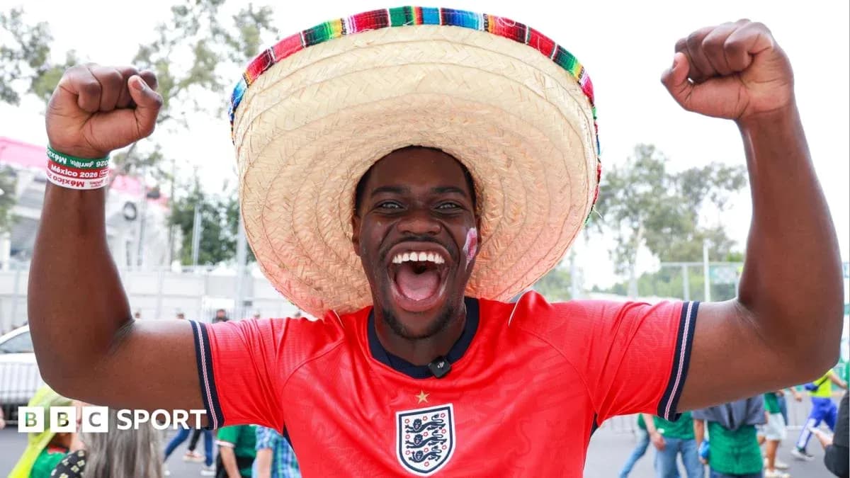 Fan celebrating with sombrero at football event