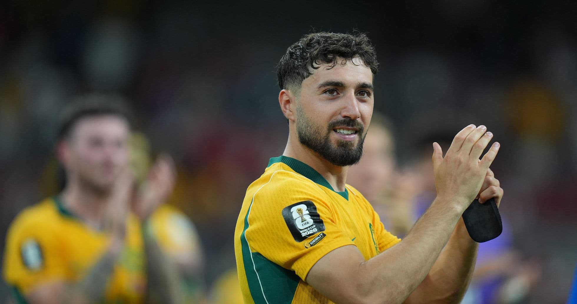 Jugador australiano aplaudiendo tras el partido