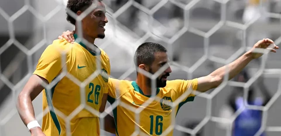 Jugadores de Australia celebrando en la cancha