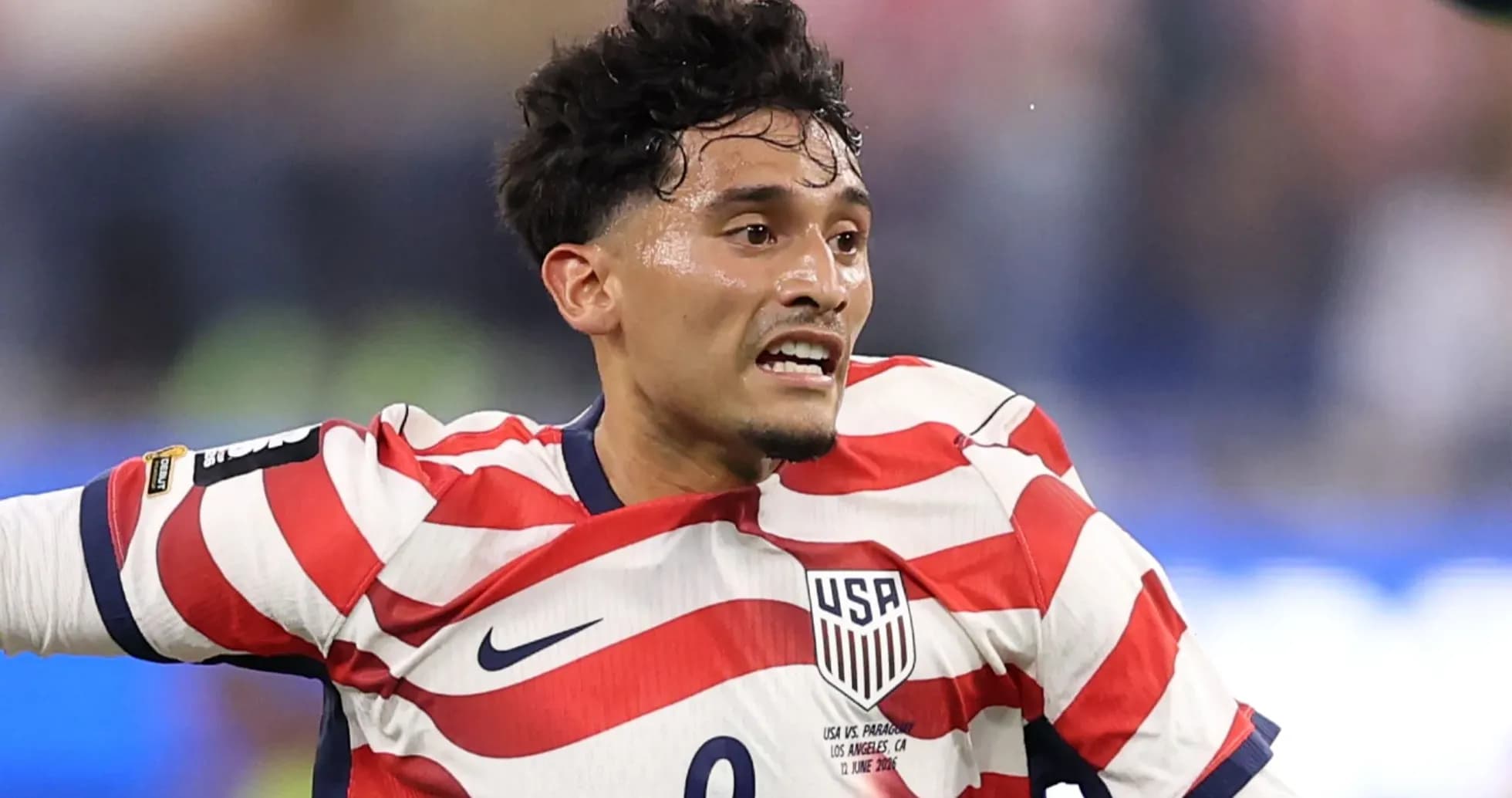 Jugador de Estados Unidos durante un partido de fútbol Jugador de Estados Unidos durante un partido de fútbol