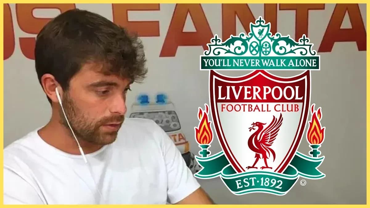 Hombre escuchando música con logo de Liverpool detrás Hombre escuchando música con logo de Liverpool detrás